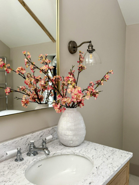 Modern bathroom vanity with sleek countertop and storage drawers