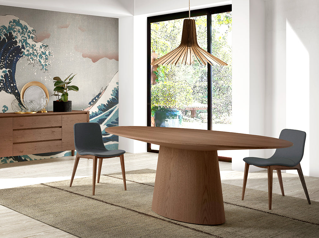 Oval dining table in walnut veneered wood.