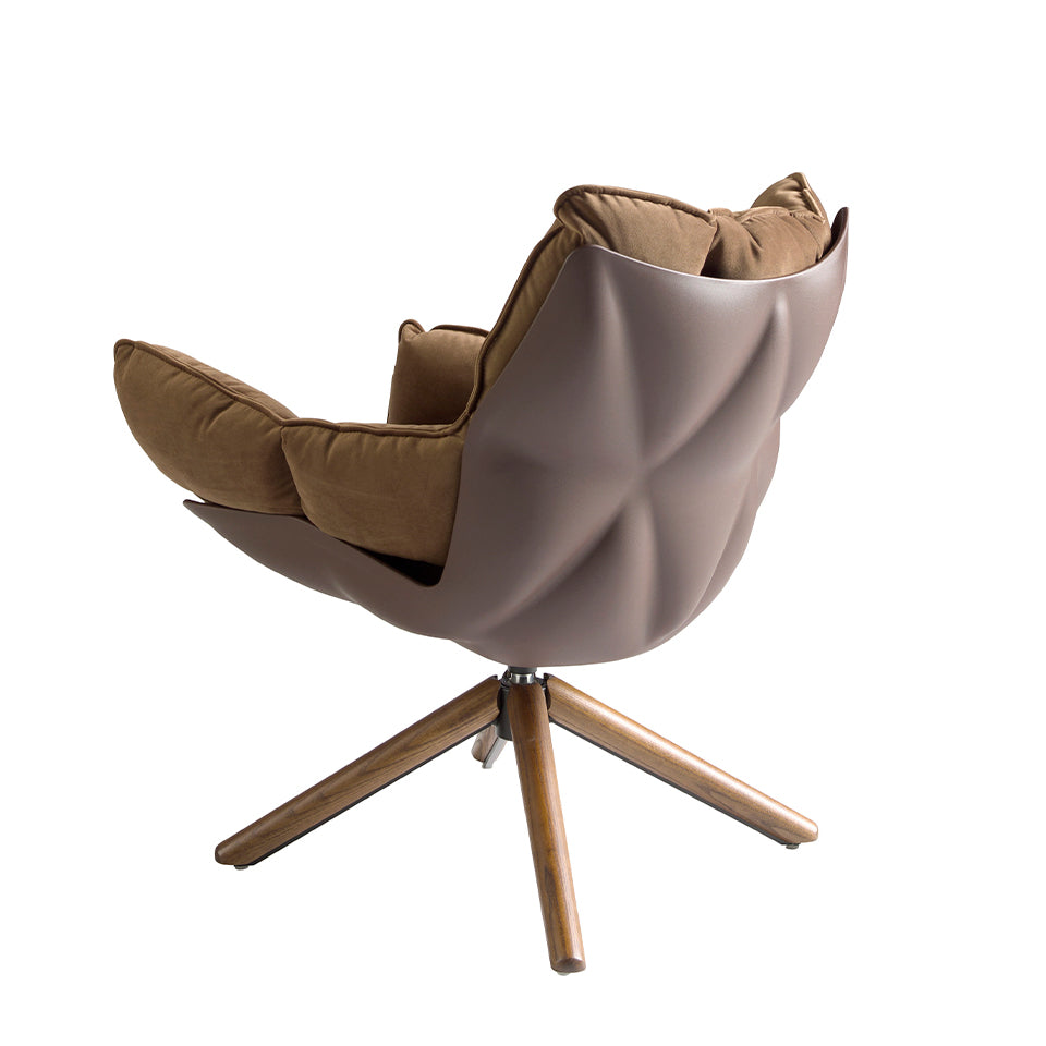 Brown velvet swivel armchair