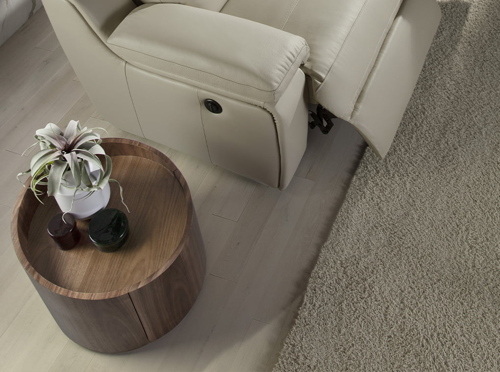 Round bedside table in walnut wood.